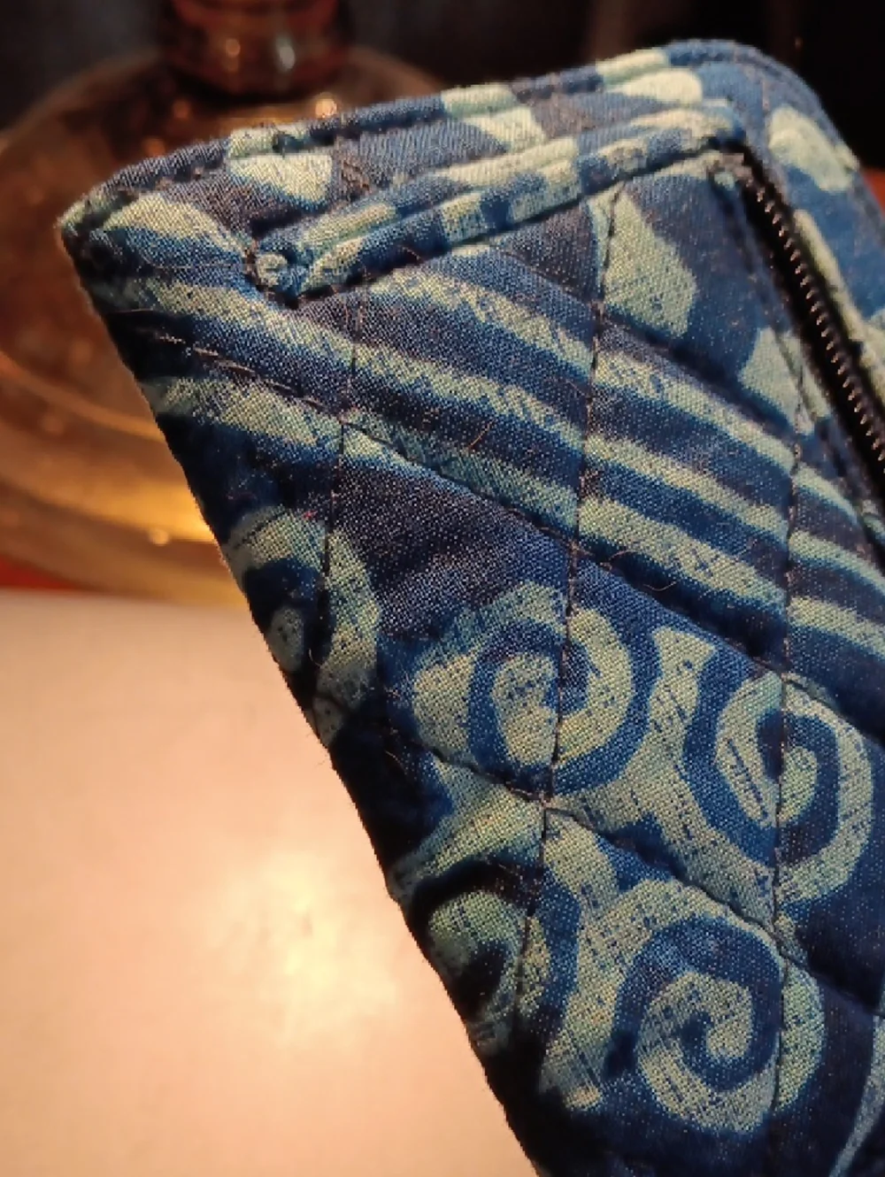 Vera Bradley Zip ID Case in a blue batik-inspired geometric pattern. - Picture 8 of 11
